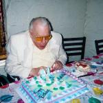 Arnold blowing out candles