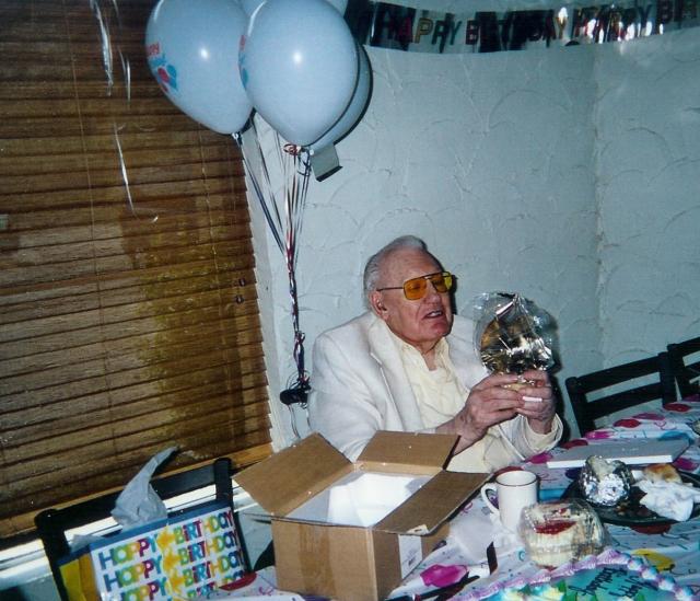 Arnold opening his gifts